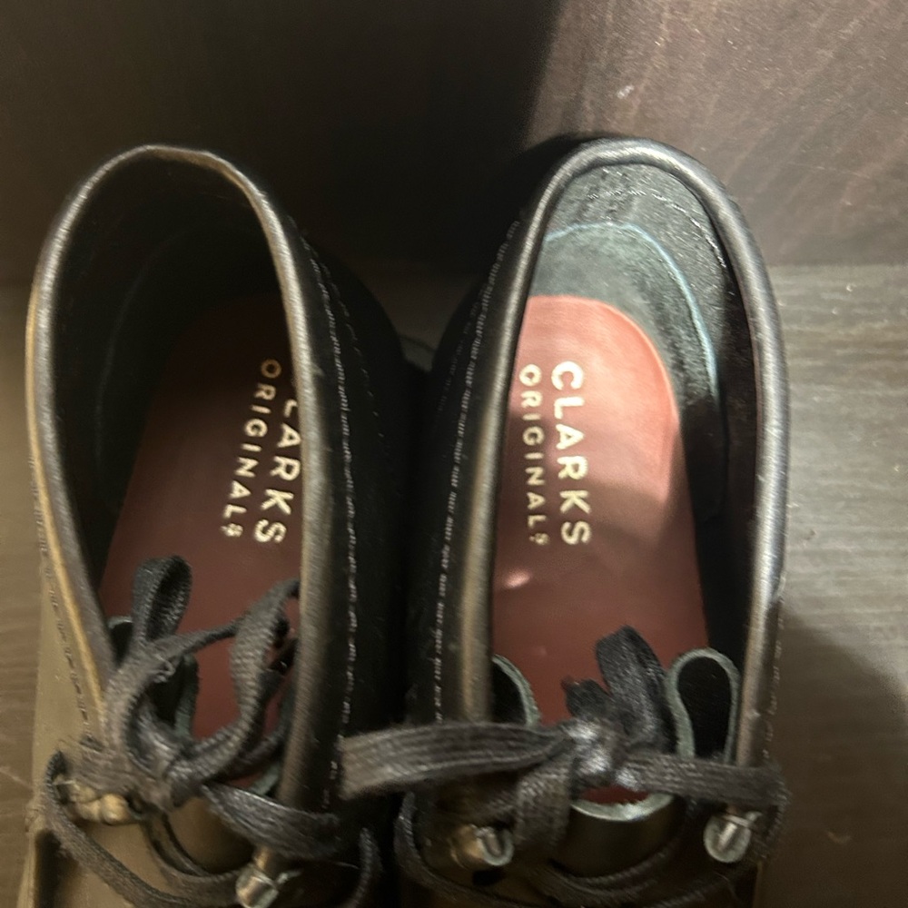 Clarks Black Leather Wallabees.